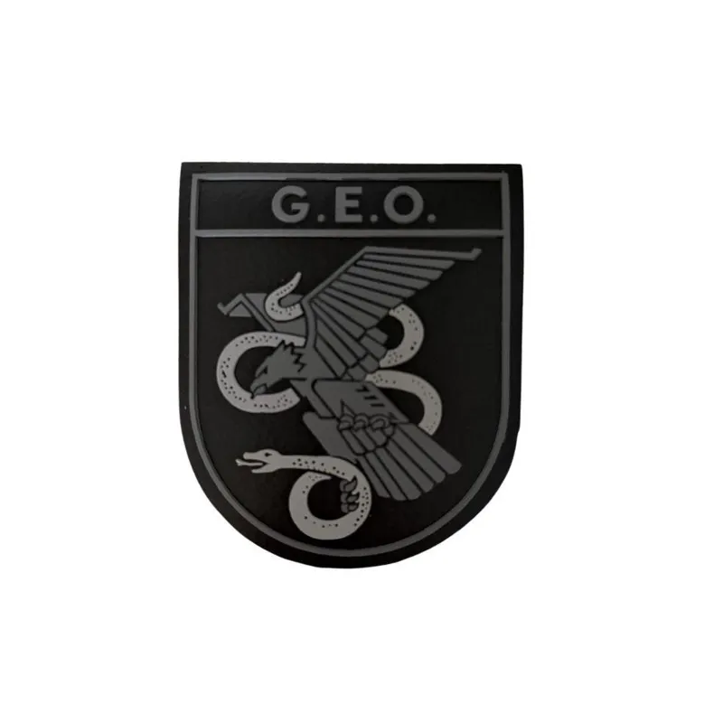 Brazo Emblema GEO · Gris