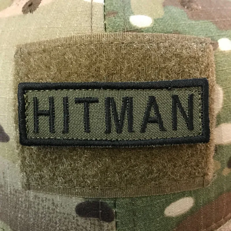 ASN – Tab Hitman – Velcro Patch – 6×2 cm · Verde / OD
