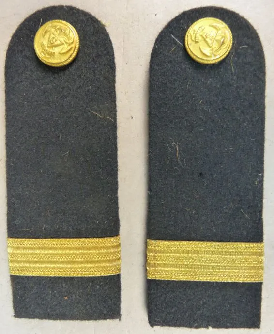 Marine Schouderstukken