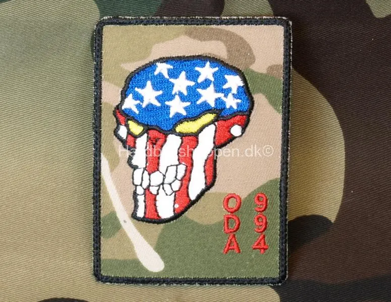 Oda 994 – 85 x 58 mm · Multicam